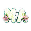 A beautifully composed sympathy tribute spells out MA in elegant white flowers, captured against a clean white background that highlights every subtle nuance of the design. Both capital letters are fully covered with small, rounded white chrysanthemums, arranged so closely that they create a plush, uniform surface, almost like freshly fallen snow. The blooms' soft, feathery petals lend a gentle texture that feels calm and comforting, while the play of light and shadow across the petals gives the letters depth and clarity. Tracing the outer edges of each letter is a rich, dark green trim, most likely satin ribbon or carefully placed foliage, folded into neat pleats that lend a crisp outline and a sense of formality, echoing the tidy greenery seen in Notting Hill's communal gardens. At the base of the M and at the lower right of the A, matching floral sprays bring in soft pastel tones. Large-headed pink roses mingle with lilac roses and dainty pink spray roses, forming gentle posies that add romance and visual focus. Delicate fern fronds and touches of fresh foliage peek out among the roses, giving the arrangement a light, airy quality and a hint of woodland grace. The tribute is clearly intended as a personalised farewell, perhaps for a mother, mama, or someone whose name begins with these letters, and would be fitting for a funeral or memorial service held in a local church or crematorium near Notting Hill. Its clean lines, muted colours, and thoughtful design speak of love, gratitude, and the wish to say goodbye in a beautifully understated way.