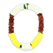 The photograph shows a traditional memorial garland suspended in a gentle U-shape, its form clearly defined against a clean, white background that makes every hue and petal stand out. This is the kind of floral piece that would feel at home in a quiet remembrance service or cultural ceremony in Notting Hill, carrying both spiritual resonance and personal emotion. Along the upper curve, you see a thick band of snowy white blossoms, tightly packed to form a smooth, cushion-like texture reminiscent of small chrysanthemums or jasmine florets, their softness suggesting calm and release. As your eye travels down either side, the garland's character deepens into lush maroon sections, the petals threaded so closely that they create almost velvety columns of colour, inviting contemplation and symbolising the weight of memory. At the bottom sweep of the U, the flowers shift again into bright, sunny yellow, like a pool of gentle light at the end of a long day wandering around the pastel terraces near Colville Square, bringing a note of comfort and renewal to the arrangement. Interspersed small clusters of vivid green leaves mark the transitions between these colour fields, especially where the whites meet the maroon and where the yellow returns to touches of white, adding freshness and a sense of living energy. The garland looks full, symmetrical, and thoughtfully composed, whether made from fresh-cut blooms or premium artificial petals intended to last beyond a single day. It stands as a visual expression of honour, remembrance, and the quiet hope that accompanies every farewell.
