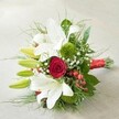 On a tranquil, softly-lit surface evocative of a Notting Hill townhouse interior, this hand-tied bouquet commands attention with its harmonious blend of classic white lilies and a bold, passionately red rose. To the upper left, majestic lilies-some fully open, displaying long, graceful petals dusted with yellow and maroon, and others gracefully budded in vibrant green-extend an invitation to linger, their purity and stately form reminiscent of the refined terraces lining Ladbroke Square. The heart of the bouquet cradles a single, tightly woven deep red rose whose velvet petals offer a stunning counterpoint to the airiness of the lilies. Surrounding these focal blooms, spherical green dianthus or button chrysanthemums provide a unique, plush texture, evoking the lush lawns of nearby communal gardens. Interwoven with these, fine sprays of white baby's breath impart a hint of gentle cloud-like softness, lightening the arrangement and offering delicate contrast. Framing the bouquet, substantial broad green leaves and subtle, feathery foliage ensure a full, organic silhouette, while scattered glossy clusters of bright red hypericum berries catch the light, their cheerful brightness adding a playful hint of natural beauty. The stems, expertly aligned, are secured by a vibrant red satin ribbon, its sheen echoing the romantic sensibility that runs through Notting Hill's vibrant local culture. With its exuberant colors and varied textures, this thoughtfully crafted bouquet is a fitting tribute to love, celebration, and the neighbourhood's flair-ideal for weddings, anniversaries, or simply bringing a touch of Notting Hill joy into any local home.