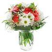 This stunning Notting Hill-inspired bouquet glows with a joyful elegance, immediately drawing the eye and lifting the spirit. At its centre, coral-pink carnations with voluptuous, frilled petals provide a lively core, radiating cheer with every fold. Interlaced throughout are crisp, white, daisy-like chrysanthemums, their plentiful petals brightening the arrangement like the first light over Portobello Market. Classic white daisies with yellow-green eyes peek through, inviting a fresh, playful energy reminiscent of nearby green spaces or garden squares. Airy sprays of baby's breath weave softly between the boldest blooms, their tiny blossoms lending an almost whimsical lightness. On one edge, the glimpse of magenta alstroemeria buds offers a quiet, colourful promise of new beauty to come. Broad, glossy green leaves gather beneath and around the bouquet, providing a lush, sculptural frame, while finer leaves interweave the arrangement, balancing its vibrancy with a grounded, organic feel. The bouquet sits gracefully in a clear glass vase, the water clean, the stems sturdy and visible-every detail a marker of freshness and quality one expects from Notting Hill florists. The strong but soft lighting brings out every nuance without distraction, creating a scene of welcoming tranquility. Such an arrangement is ideal for special occasions, sending a heartfelt thank you, or brightening a home; it captures the everyday poetry and refined charm of life in Notting Hill.
